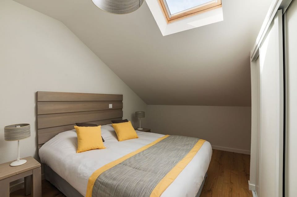 Drift to sleep in the sleeping alcove. Please note that bedding configurations vary and the sleeping alcove is not always closed off.
