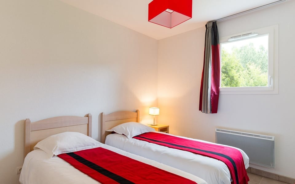 The master bedroom sleeps up to 2 people - bedding configurations may vary