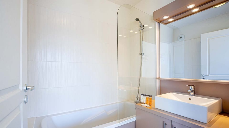 Indulge in self-care and relaxation in your cozy bathroom.