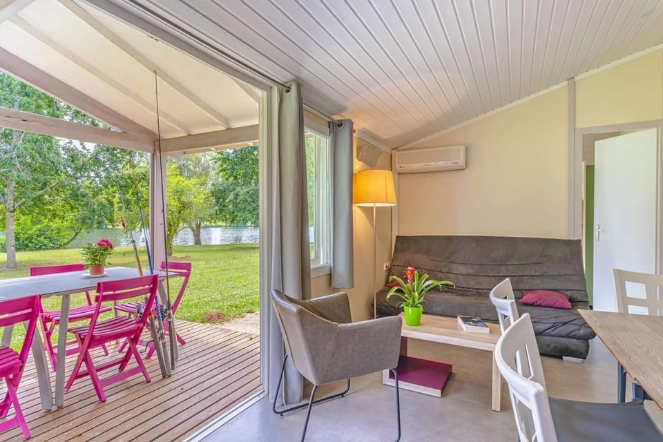 Sit back and relax in the cozy living area after a great day. (PLEASE NOTE: Views Vary).