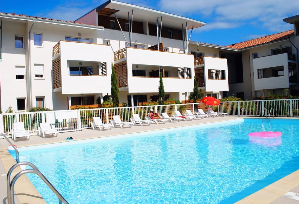 Spend time with family and friends in the outdoor pool during the summer.