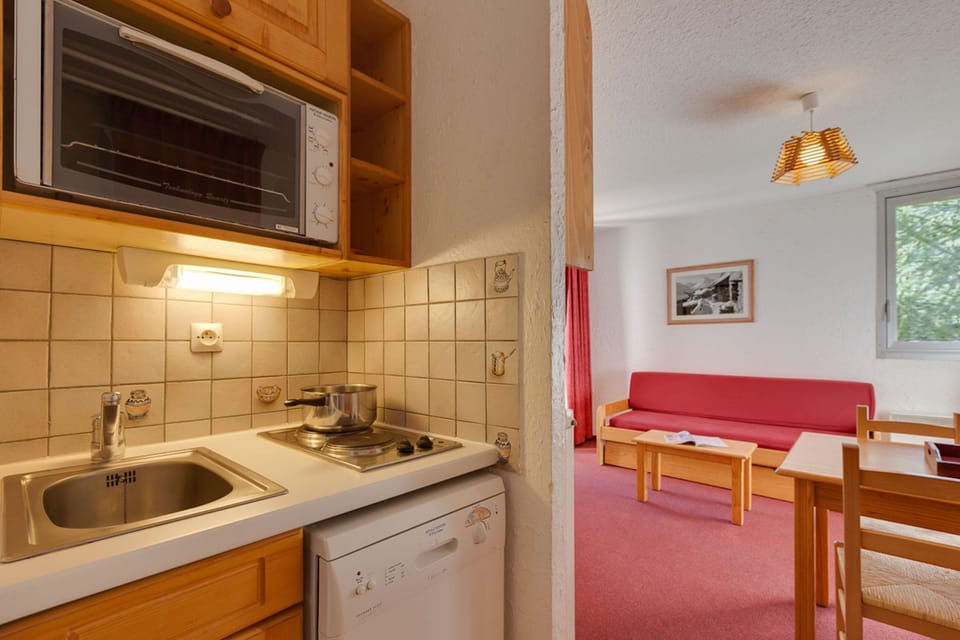 Prepare a meal in the equipped kitchen.