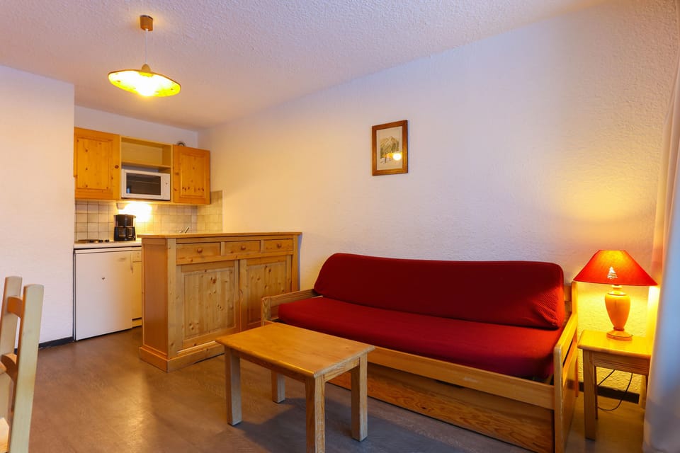 Snuggle up with a cup of coffee or tea on the comfortable sofa.