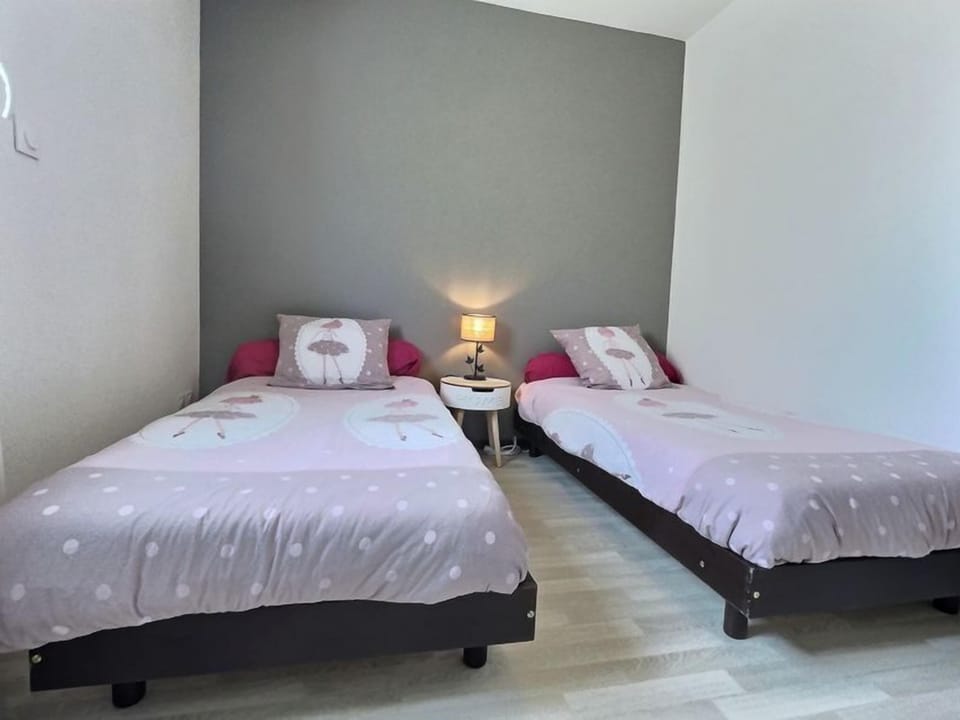 Get a good night's rest in the cozy bedroom.