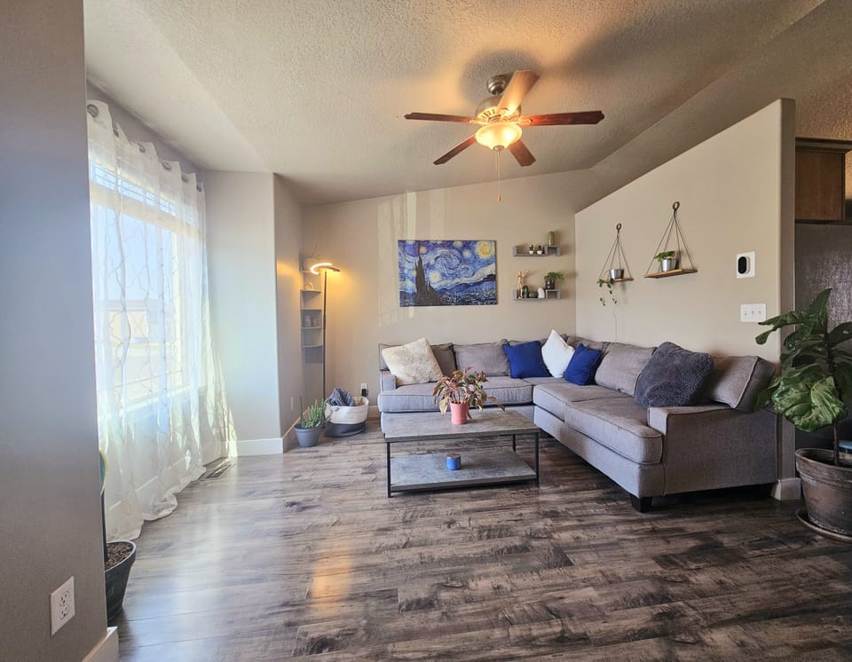Living room next to the kitchen area. 