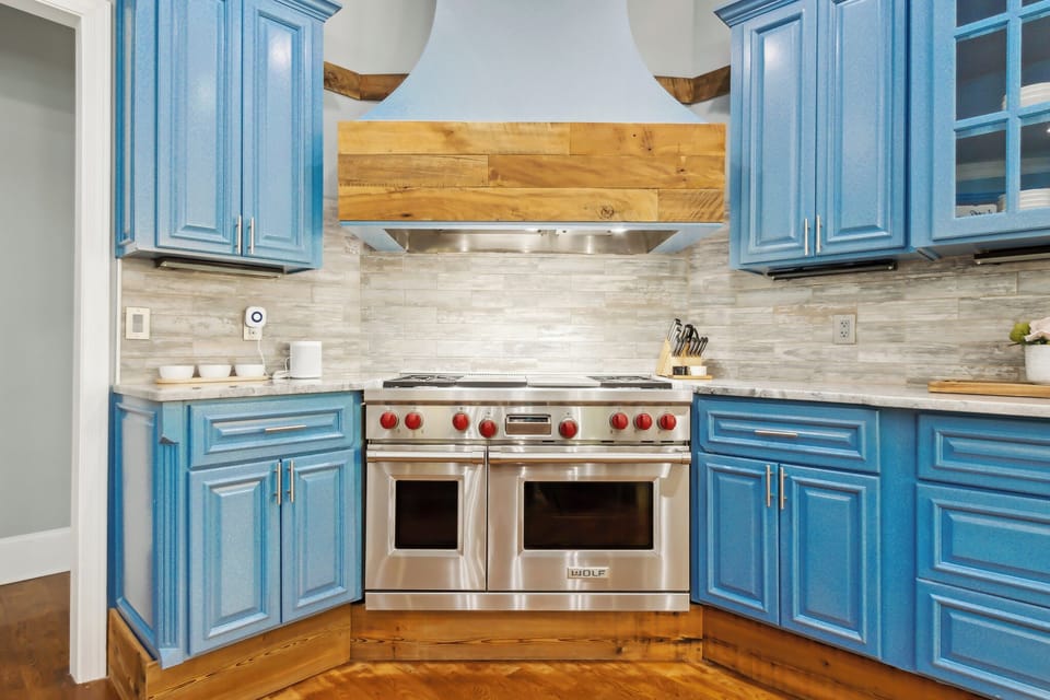 Main floor kitchen with Wolf cooktop & ovens.