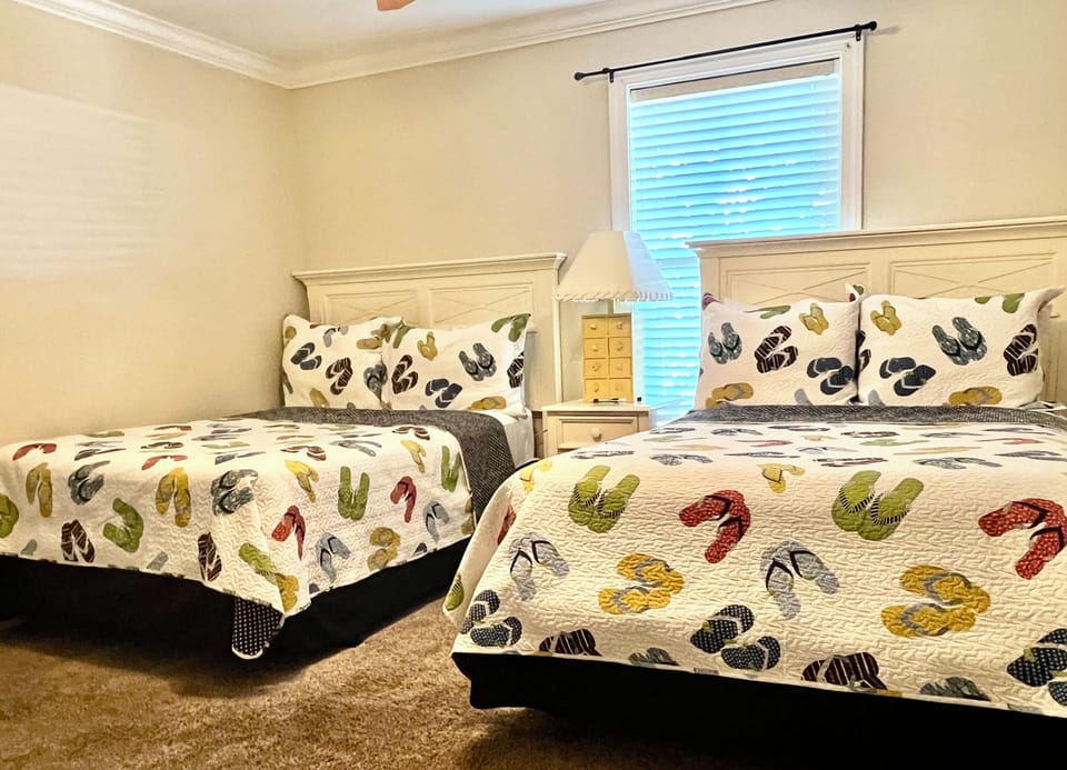 bedroom 3 with two double beds