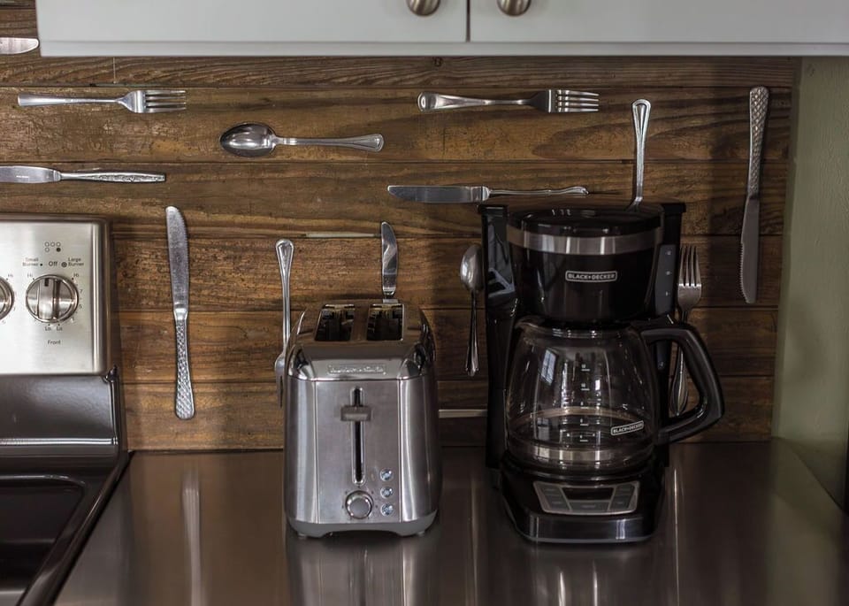 Several individual packages of coffee are provided.