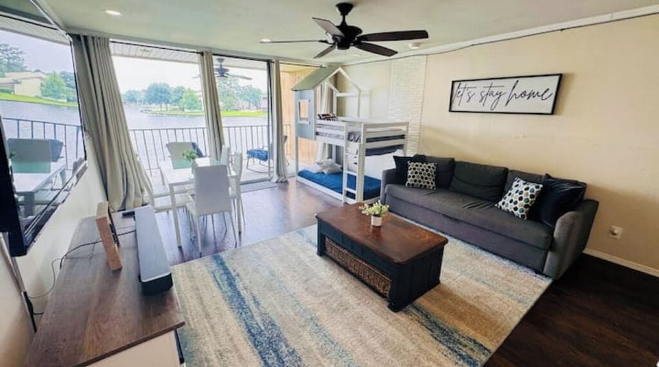 Recently remodeled open living room with a beautiful view of the lake. 