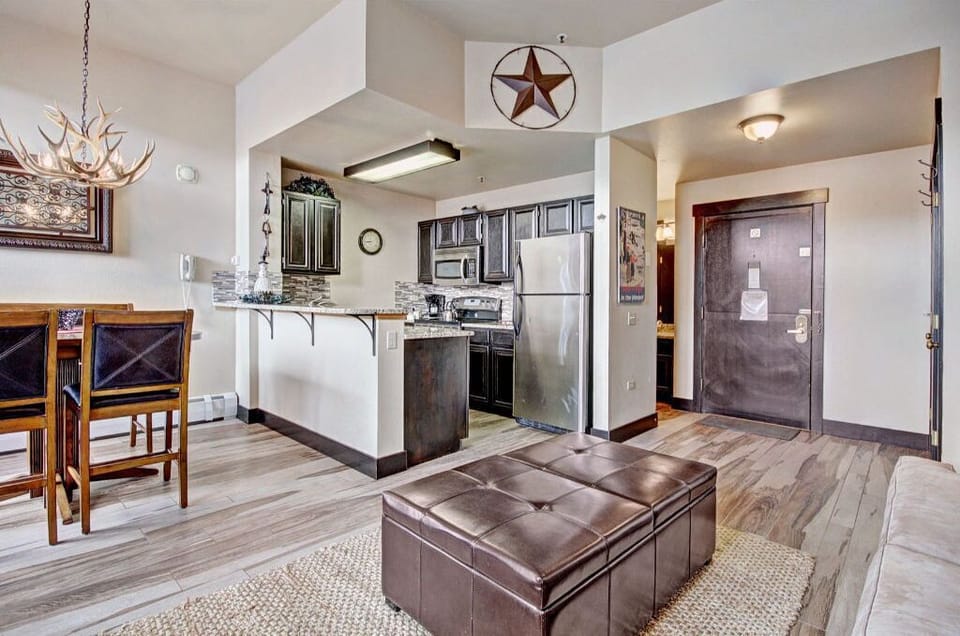 Enjoy the open-plan living area with a seamless flow from the living room to the kitchen, perfect for entertaining.