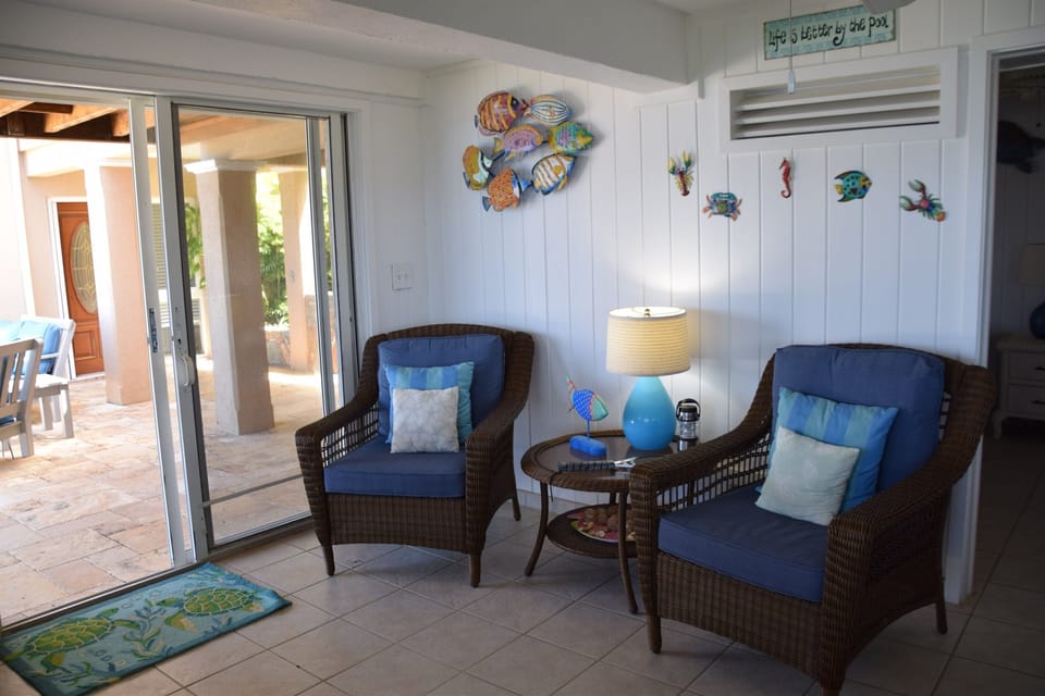 Cabana family room that opens to pool deck