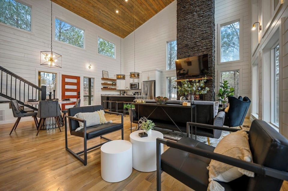 Open floor plan living opens to kitchen and dining