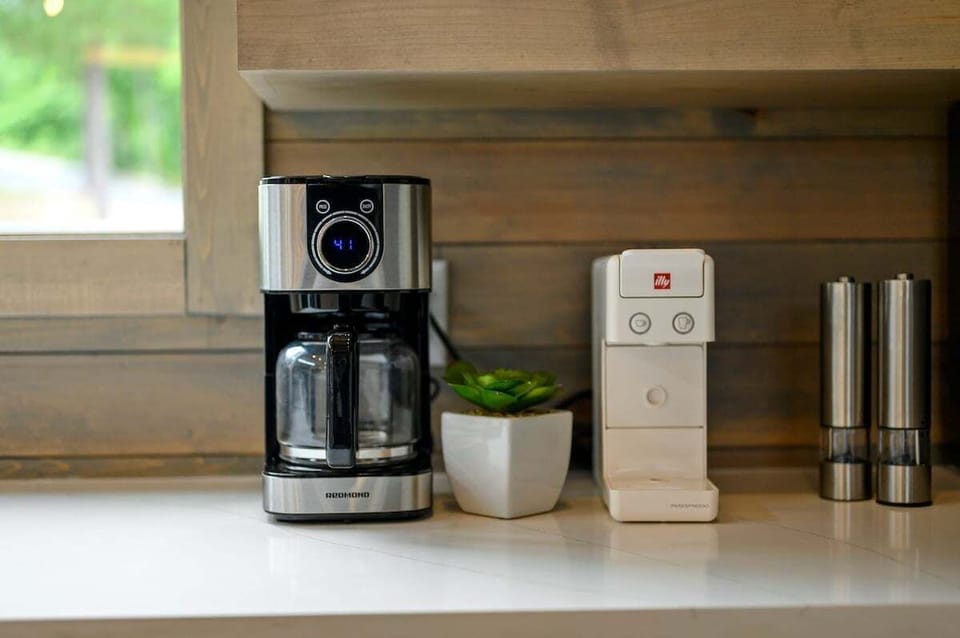 illy espresso machine and a drip coffee pot available