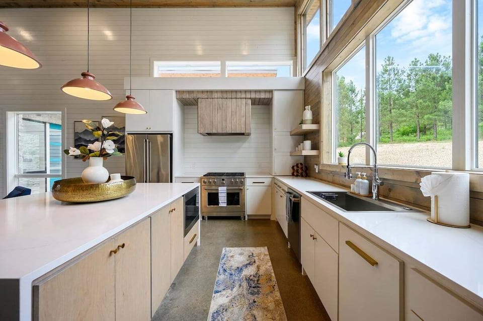 Gas stovetop, oven, microwave, dishwasher, refrigerator, and freezer