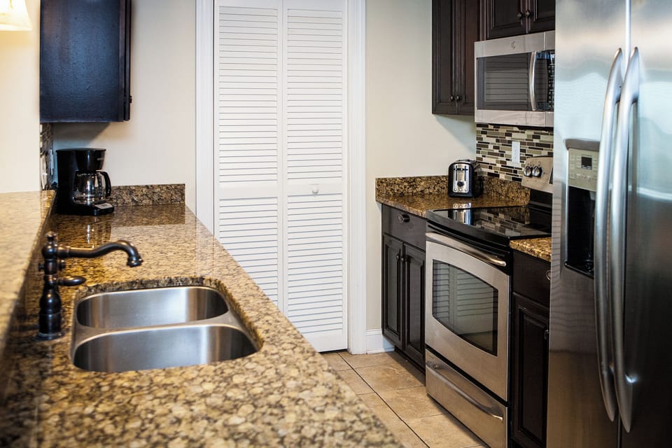 Another view of fully equipped kitchen