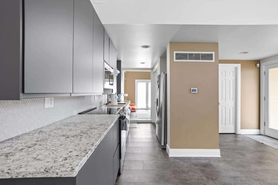 Our pristine kitchen space offers full functionality with appliances, utensils, and more!