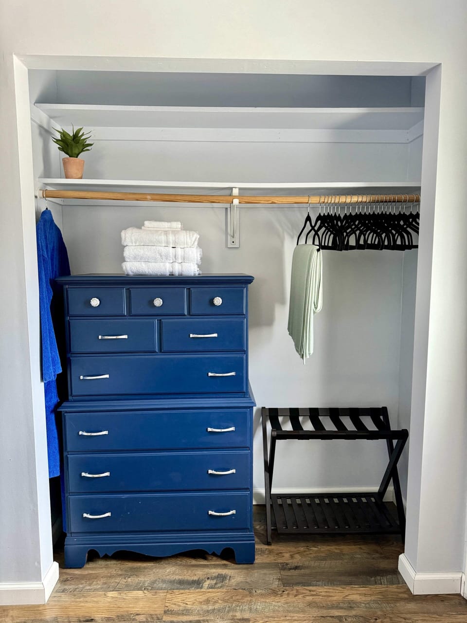 Plenty of space in the closet for hanging clothes or tucking them away in the dresser. A luggage rack is available too. 