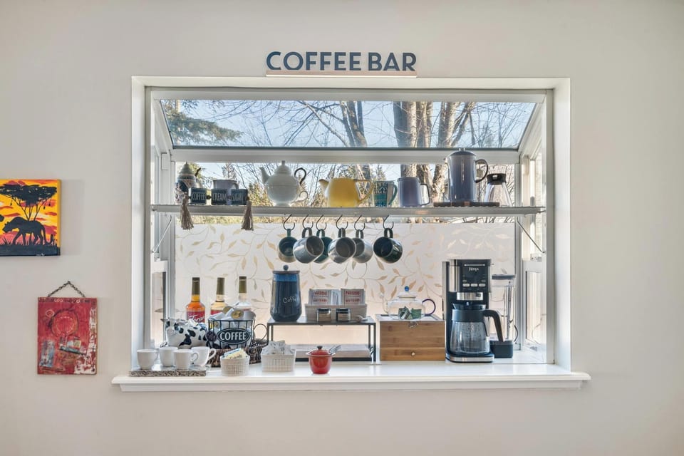 Start your day at the coffee bar, stocked with everything you need for your favorite brew.