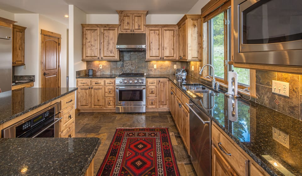 Open Concept Kitchen with Stainless Steel Appliances