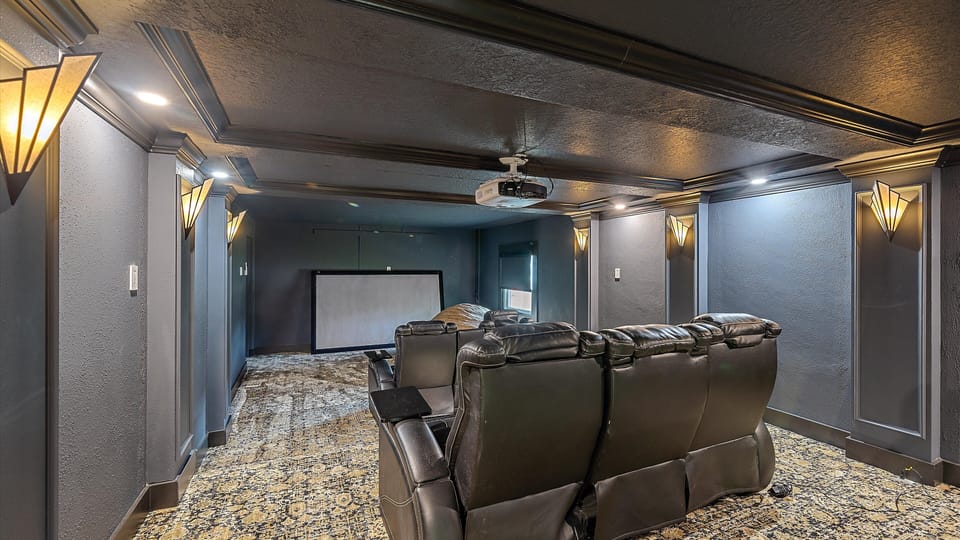 Enjoy a true cinematic experience in your own private home theater, featuring plush seating and a huge screen for the ultimate streaming night with the Smart TV technology.