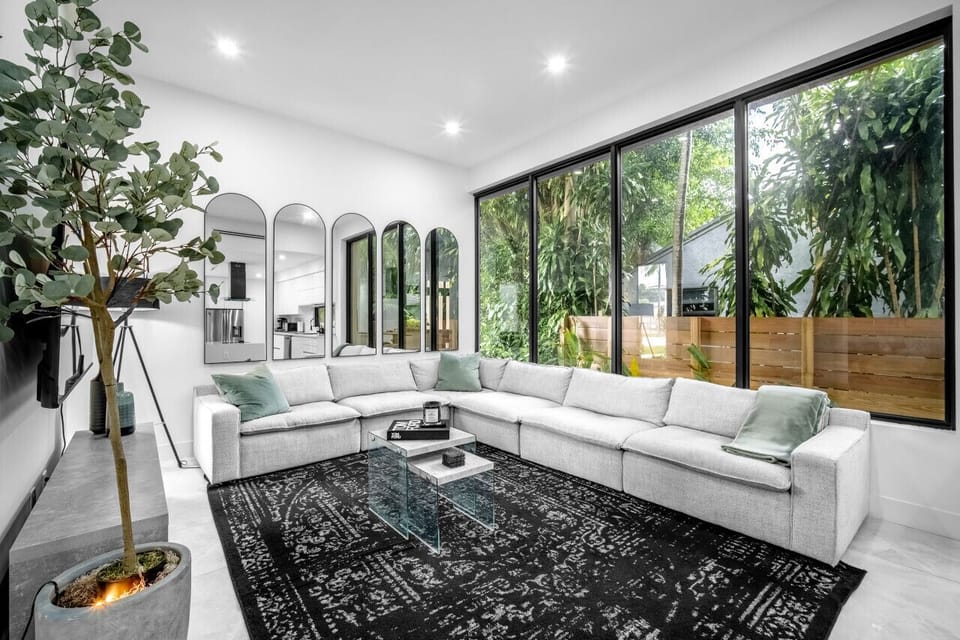 Comfortable and luxurious furniture throughout the living room and all areas.