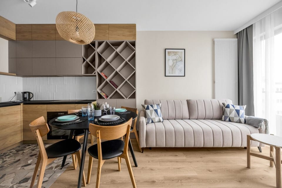 Comfortable Living Room with Sofa Bed and Smart TV | Book Now with RENTUJEMY