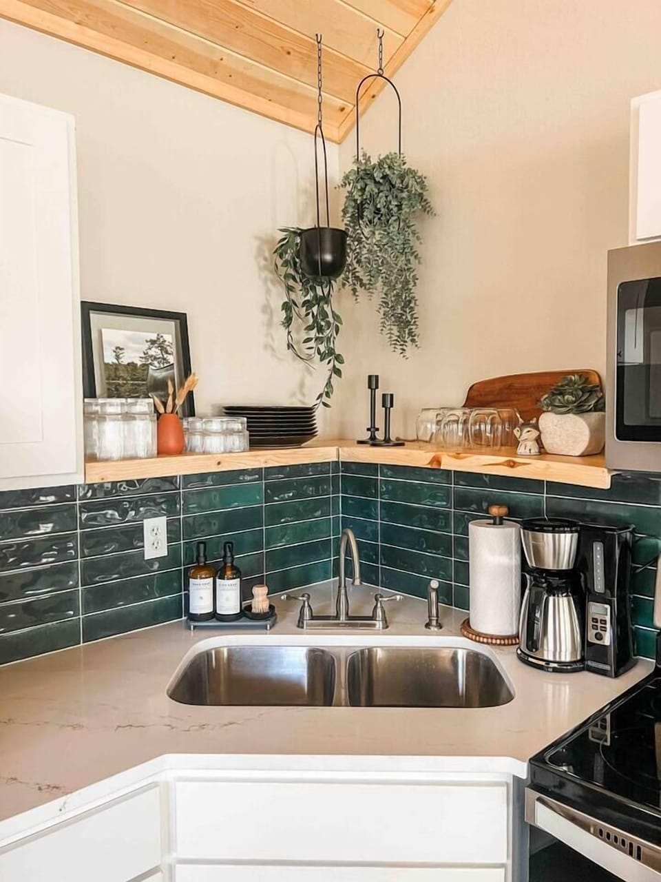 Our fully stocked kitchen includes a setting for 8 along with wine glasses, pots and pans, strainer, cutting boards, baking sheets, and a regular coffee pot. 