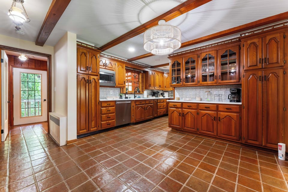 Kitchen with 2 refrigerators and Viking range