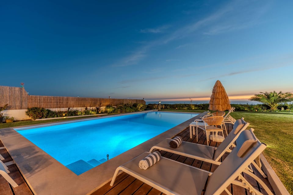 Private pool and sun terrace at sunset — Villa Atlantic Blue, holiday villa in Mafra