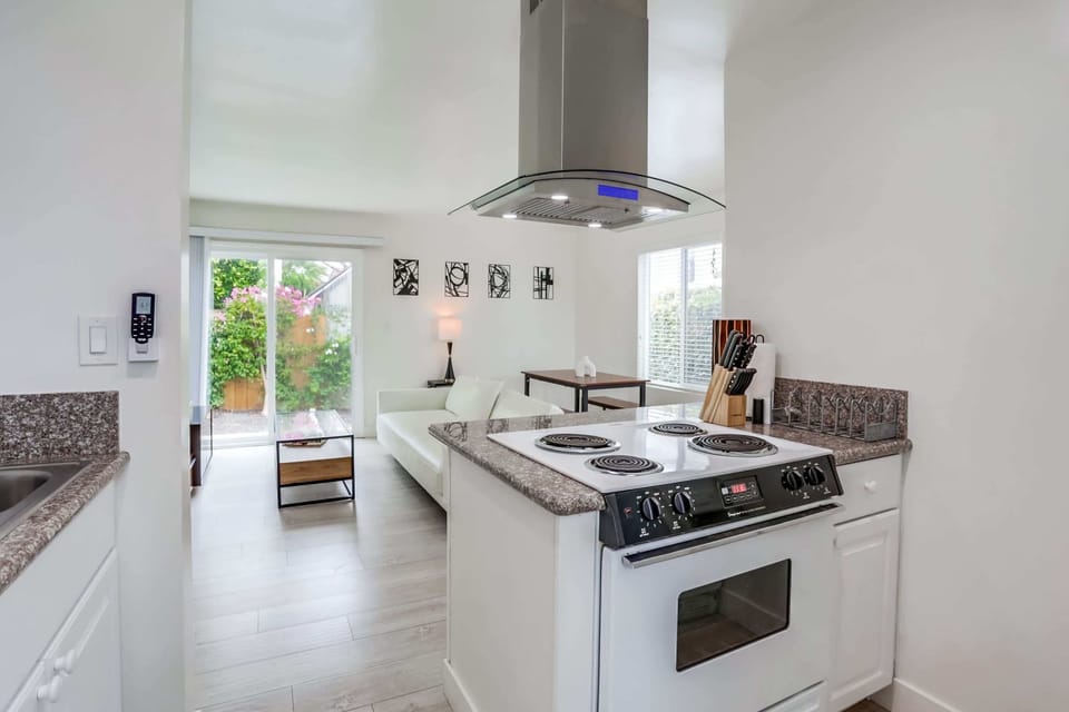 Oven has been updated with an open view into the living room