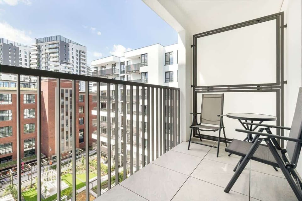 Balcony with garden furniture.