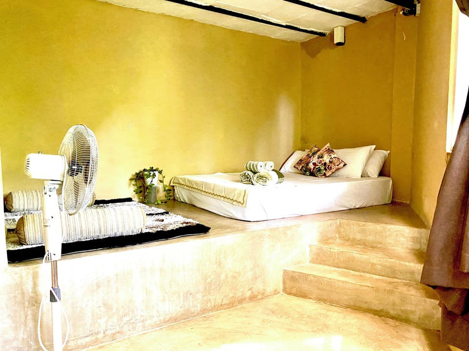 Comfy cozy queen bed room with triangle shape 