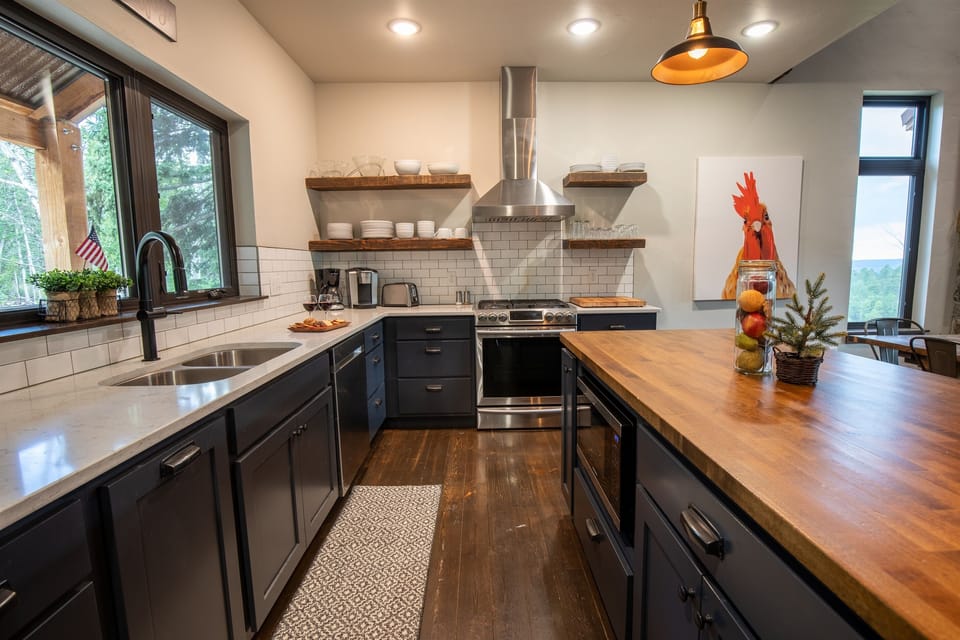 High-end gas range means your meals here are genuinely good — not just what you packed because it travels well. This stove has handled full holiday-scale productions.