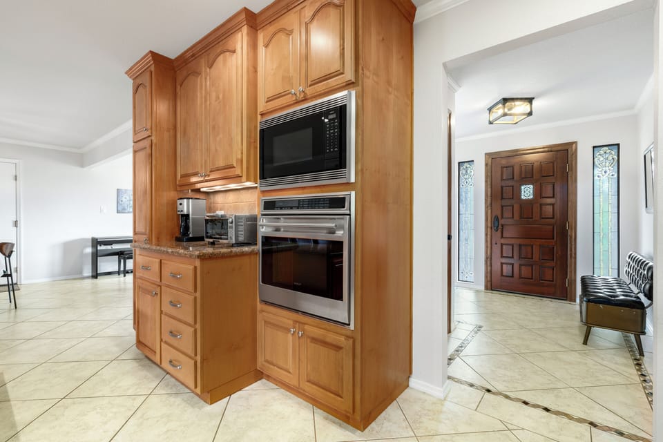 Microwave, second Wolfe oven, toaster oven, and essential coffee station.