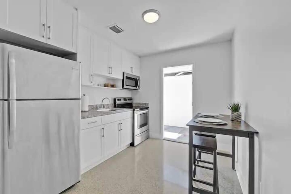 Enjoy the convenience of a full kitchen, complete with modern appliances, ample counter space, and all the essentials you need to prepare delicious meals during your stay.