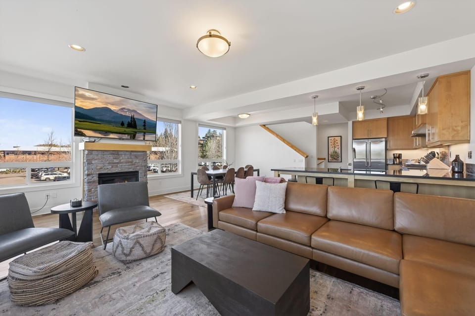 Spacious open-concept on the main floor with gas fireplace and modern kitchen