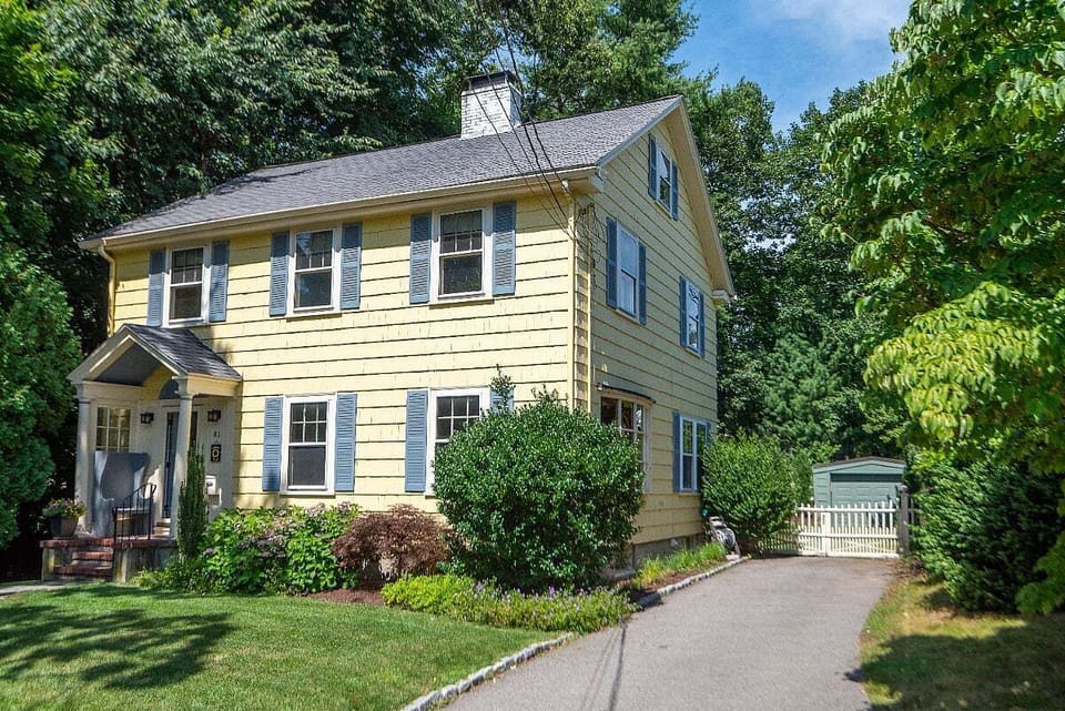 House with driveway for two cars.
