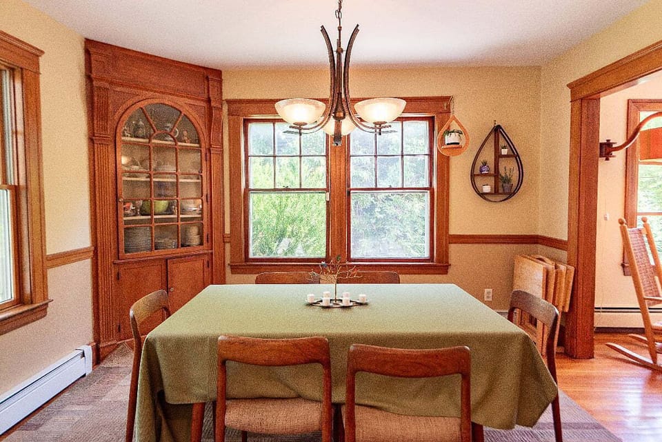 Dining room off kitchen.  Expandable with table leaf and extra folding chairs