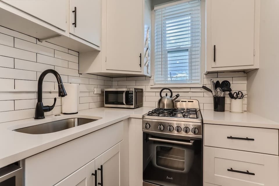 All new appliances, fixtures, counter tops and utensils in the kitchen