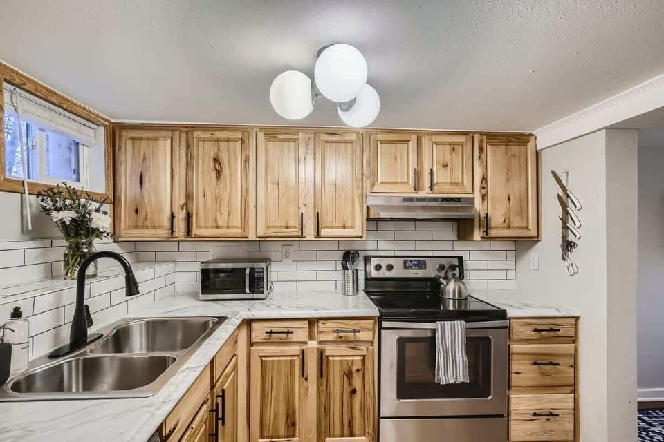 The weathered oak finishes are the cherry on top for this kitchen