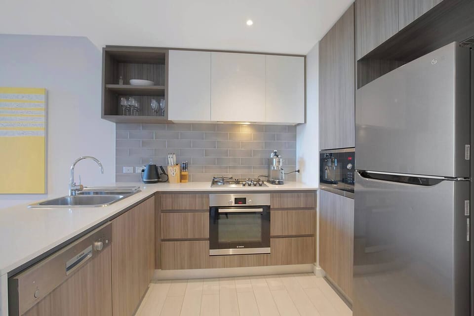 The kitchen comes fully equipped for your holiday catering with sleek appliances and cooking utensils.
