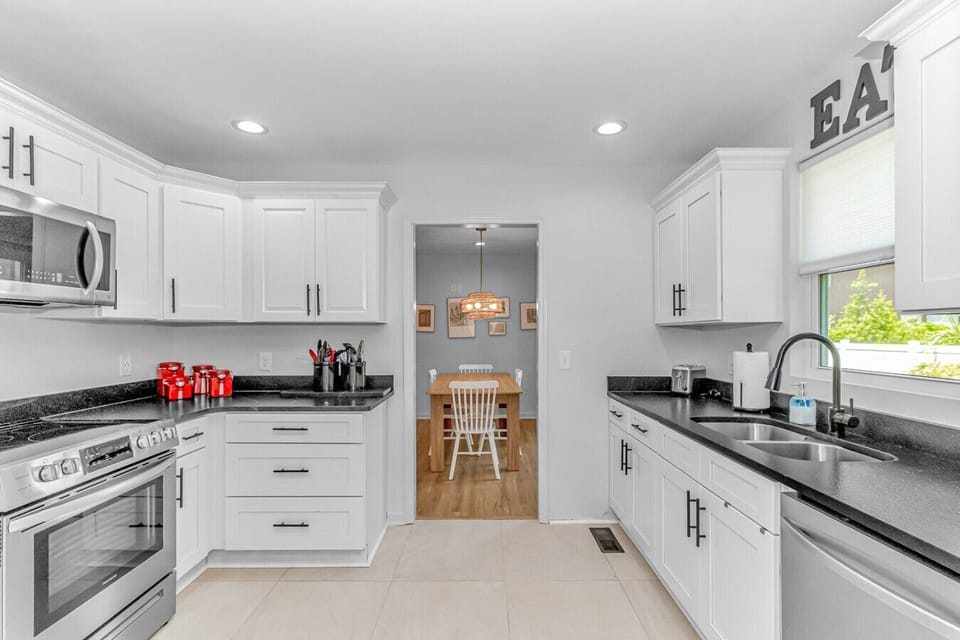 Updated kitchen with full appliances and easy access to dining space ideal for meals and entertaining