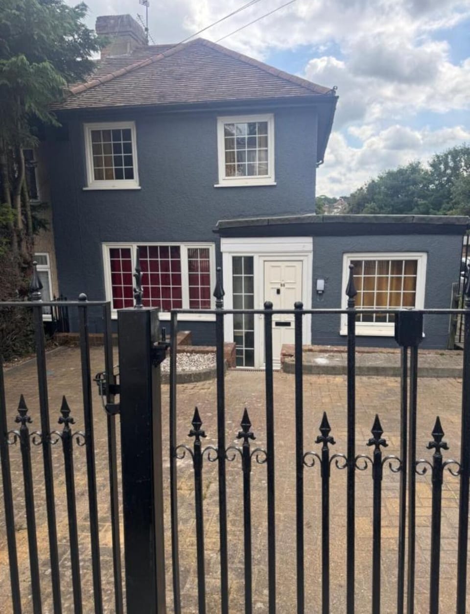 Property entrance with gated driveway