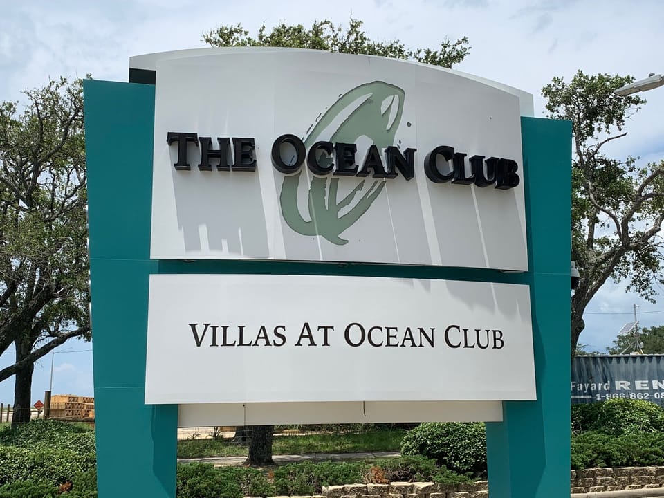 Ocean Club sign on Beach Blvd