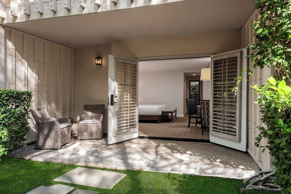 Linger in shaded outdoor seating just steps from your room.
