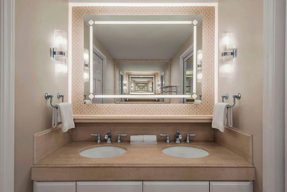 Start the day in a bright vanity nook with luxe lighting.