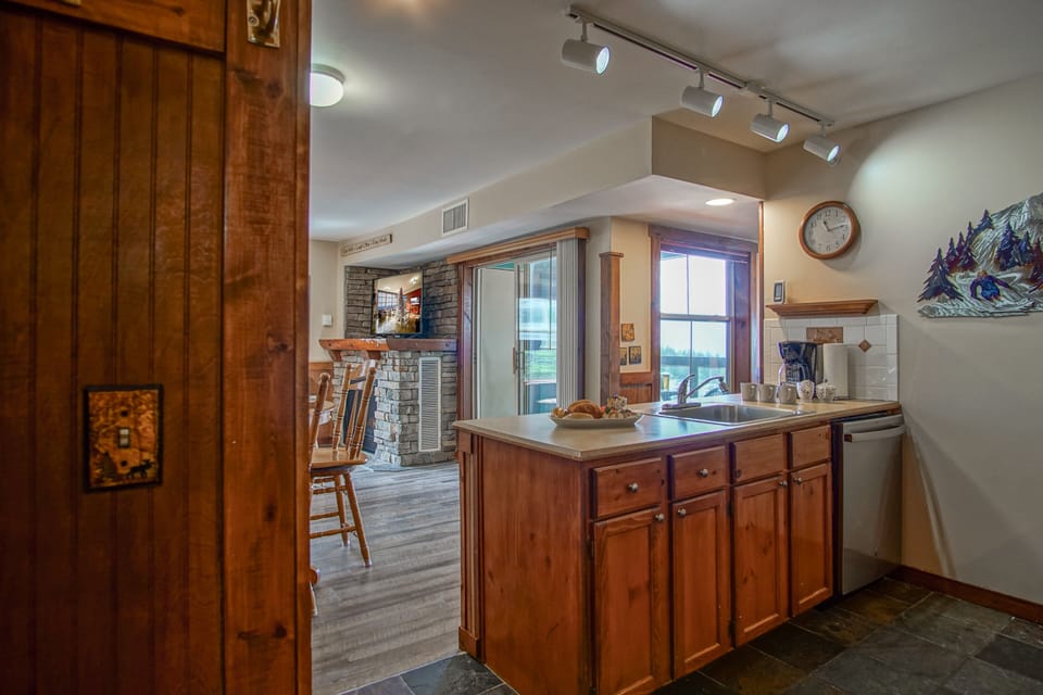 The kitchen, dining area, and living have an open feel.