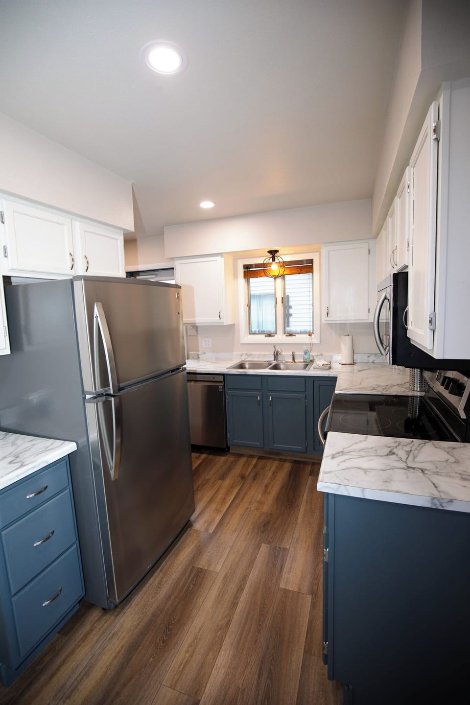 Bright kitchen with updated appliances makes preparing meals a pleasure