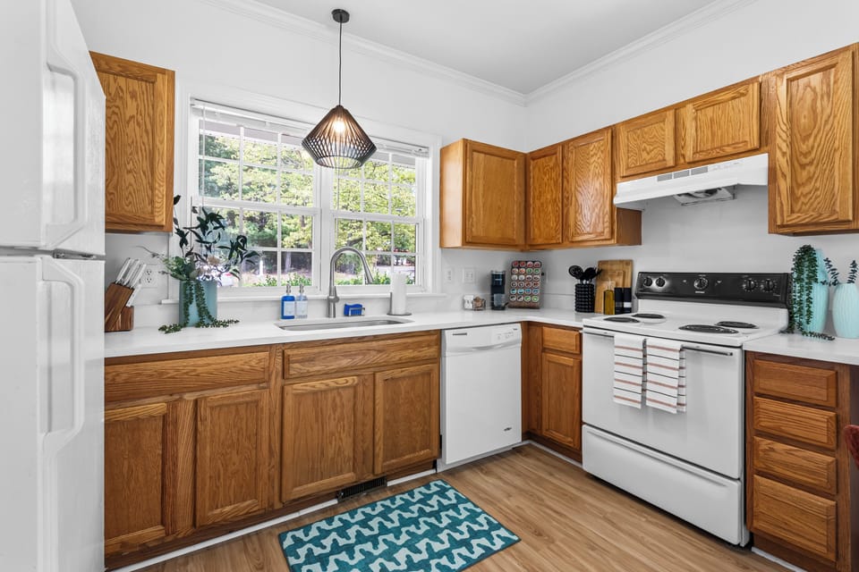 spacious kitchen with hardwood floors
