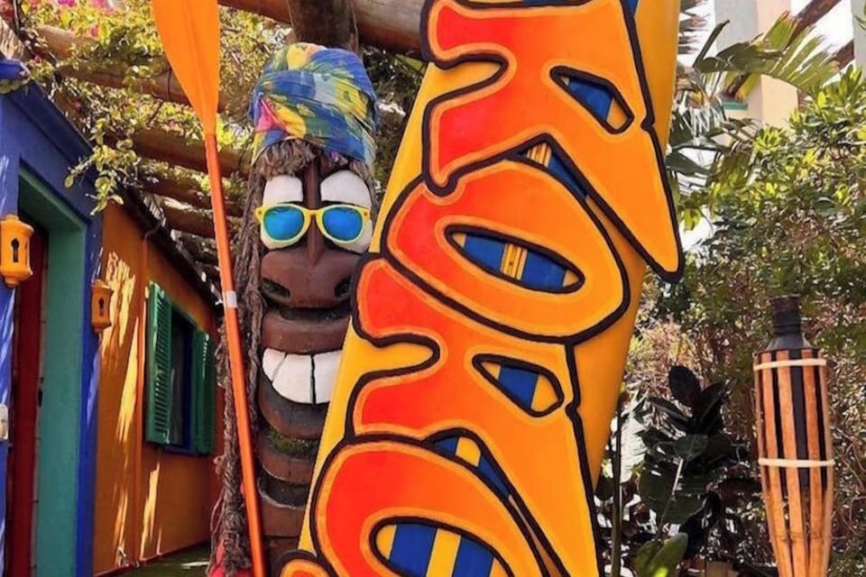Smiling, hand-carved Tiki-Mon made from driftwood at the entrance to welcome guests :-) 
